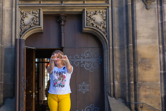 Girl near the German Church with protest poses