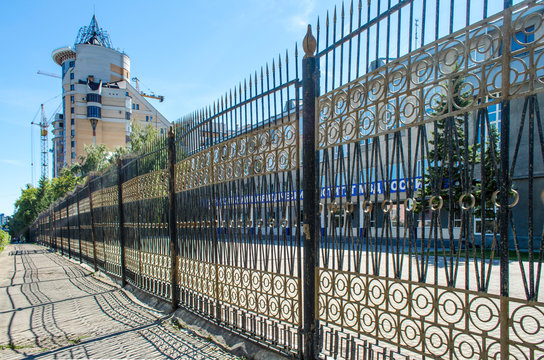 Openwork metal fence in the center of Barnaul. Altai territory