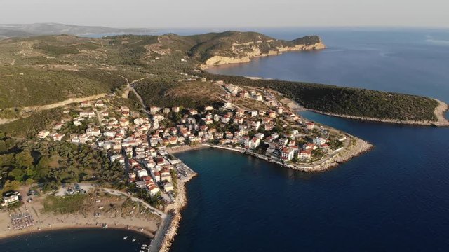 Thassos island panoramic video footage shot at sunset using a drone near Aliki town and beach