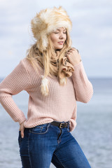 Woman on beach presenting fashion