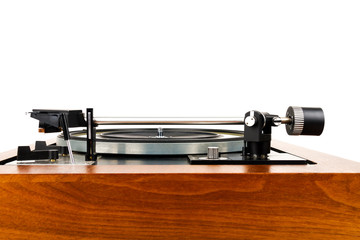 Fototapeta na wymiar Side view of vintage turntable vinyl record player isolated on white