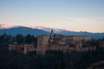 Fototapeta na wymiar Sunset view of the Alhambra from San Nicolas viewpoint (Mirador de San Nicolas). Granada, Spain