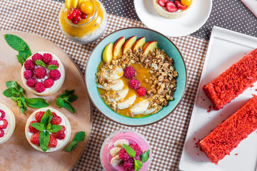 Porridge of muesli with fruit. Fresh fruit in porridge. Muesli with fruits. Muesli with fruit puree.