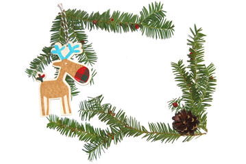Frame of pine needles. Decoration balls, deer and gifts. On a white background. Create cards, greetings.