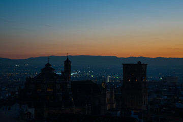 Sunset view on Granada city and Granada Cathedral. Granada, Spain