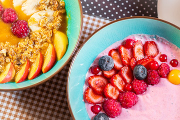 Porridge of muesli with fruit. Fresh fruit in porridge. Muesli with fruits. Muesli with fruit puree.