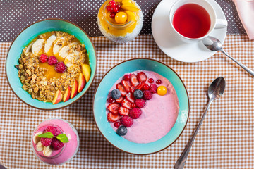 Porridge of muesli with fruit. Fresh fruit in porridge. Muesli with fruits. Muesli with fruit puree.