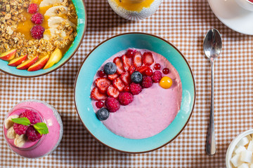 Porridge of muesli with fruit. Fresh fruit in porridge. Muesli with fruits. Muesli with fruit puree.