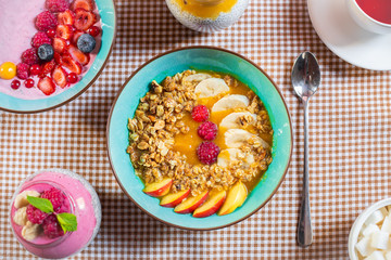 Porridge of muesli with fruit. Fresh fruit in porridge. Muesli with fruits. Muesli with fruit puree.