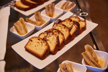 cupcakes in the form of sliced bread are on a white plate