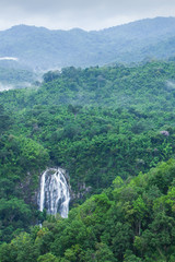 Aerial view of tropical waterfall in a rainforest.