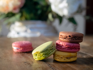 Stack of macaroons on rustic wooden table