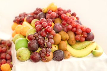 Naklejka na ściany i meble Fruit heap on the table