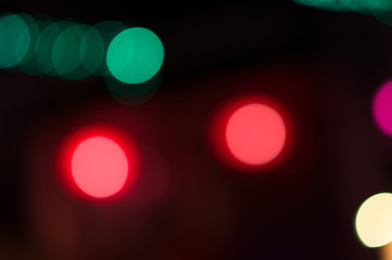 City, street, night defocused, light & blur bokeh. Colorful & dark background.