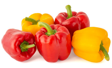 Two yellow and three bright red sweet ripe appetizing bell peppers