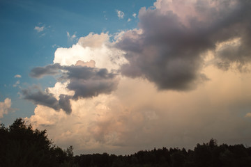 clouds in the sky in the setting sun