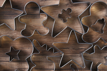 Closeup overhead view of a group of assorted cookie cutters - Powered by Adobe