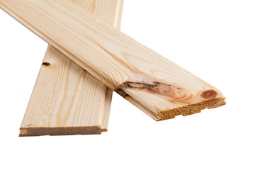 Pine board folded stack. Carpentry. Wood boards folded on each other.