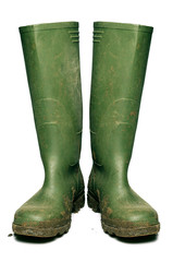Wellington boots covered in mud, cut out