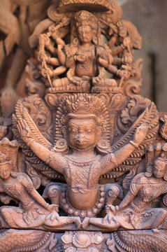Ancient wooden bas-relief with Hindu God Garuda at Palace on Durbar Square in Patan, Nepal