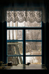 old house, winter outside the window, table by the window