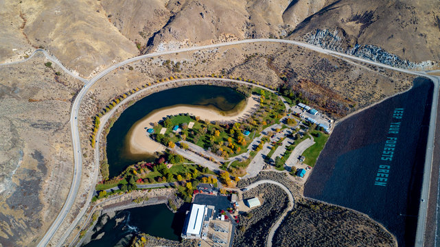 Hydroelectric Earthen Dam on the Boise River in Idaho with public park in autumn