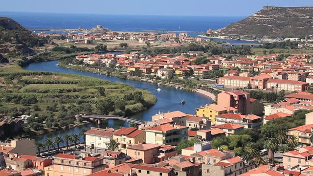 panoramic view colorful houses and red roofs of Bosa town in Sardinia