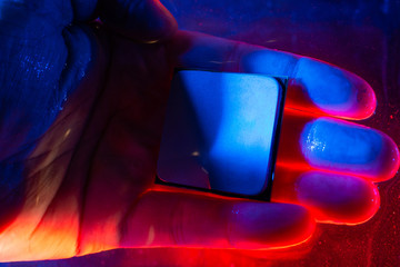 Central processor under water, cpu, blue and red light, under water. Technology of cyber-electronic...