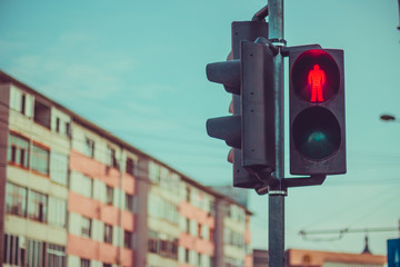 Traffic light with sign for pedestrians at crosswalk intersections