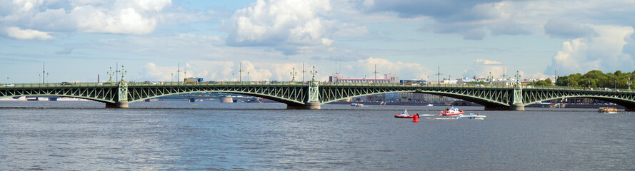 Fototapeta na wymiar Troitsky drawbridge bridge across the Neva River in St. Petersburg.