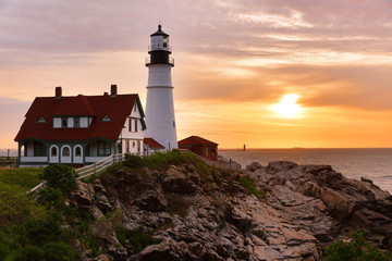 Fototapeta na wymiar The Portland Head Light Under Beautiful Sunrise Skies, Portland,Maine, USA