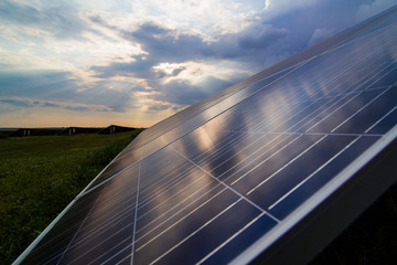 Solar panels closeup on sunset background