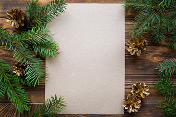 Golden pine cones and fir tree branches, mock up. COpy space.