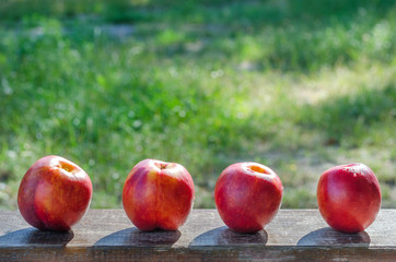 Nectarines on wooden table