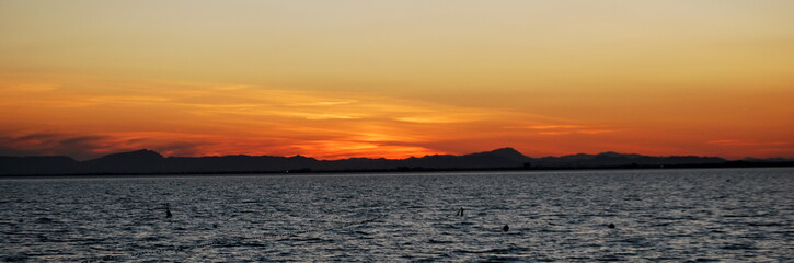 Fototapeta premium Spain, Murcia. Panoramic of sunset in the minor sea.