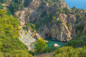 Beautiful blue lagoon surrounded by high rocks. Mediterranean sea, Turkey, Alanya.