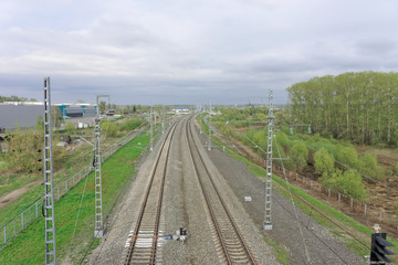Naklejka na ściany i meble Leaving the rails. Photo from the elevation above the railway tracks