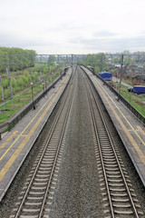 Fototapeta na wymiar Leaving the rails. Photo from the elevation above the railway tracks