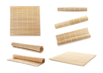 Selbstklebende Fototapeten Set with bamboo mat on white background © New Africa