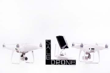 Flying drones on white background. Theme selling and buying drone