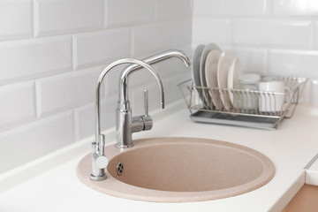 Empty kitchen sink with faucets. Idea for interior design