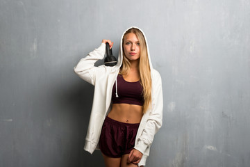 Young sport woman with kettlebell