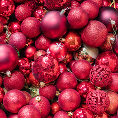 Christmas balls red and gold background, toned