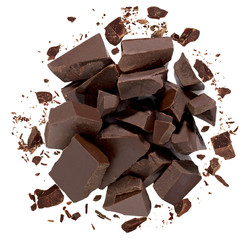 Dark Cracked chocolate pile top view isolated on white background