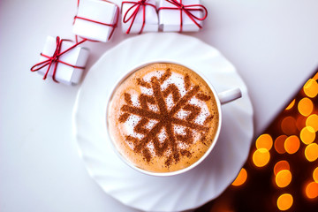 Cappuccino with a pattern of snowflakes