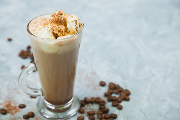 Latte coffee arabica espresso beans dark chocolate background.