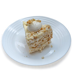 piece of meringue cake on a plate isolate