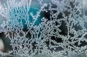 A frosty pattern on the glass. Christmas and New Year's texture.
