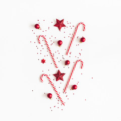 Christmas composition. Red decorations on white background. Christmas, winter, new year concept. Flat lay, top view
