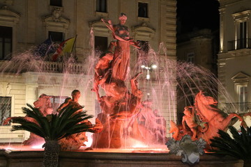 The Fontana di Artemide at Piazza Archimedes in Syracuse, Sicily Italy - obrazy, fototapety, plakaty